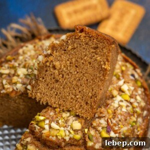 Parle G Biscuit Cake is an easy eggless cake made using Parle G biscuits. This recipe is a one-bowl recipe and is super easy to make. Do try.