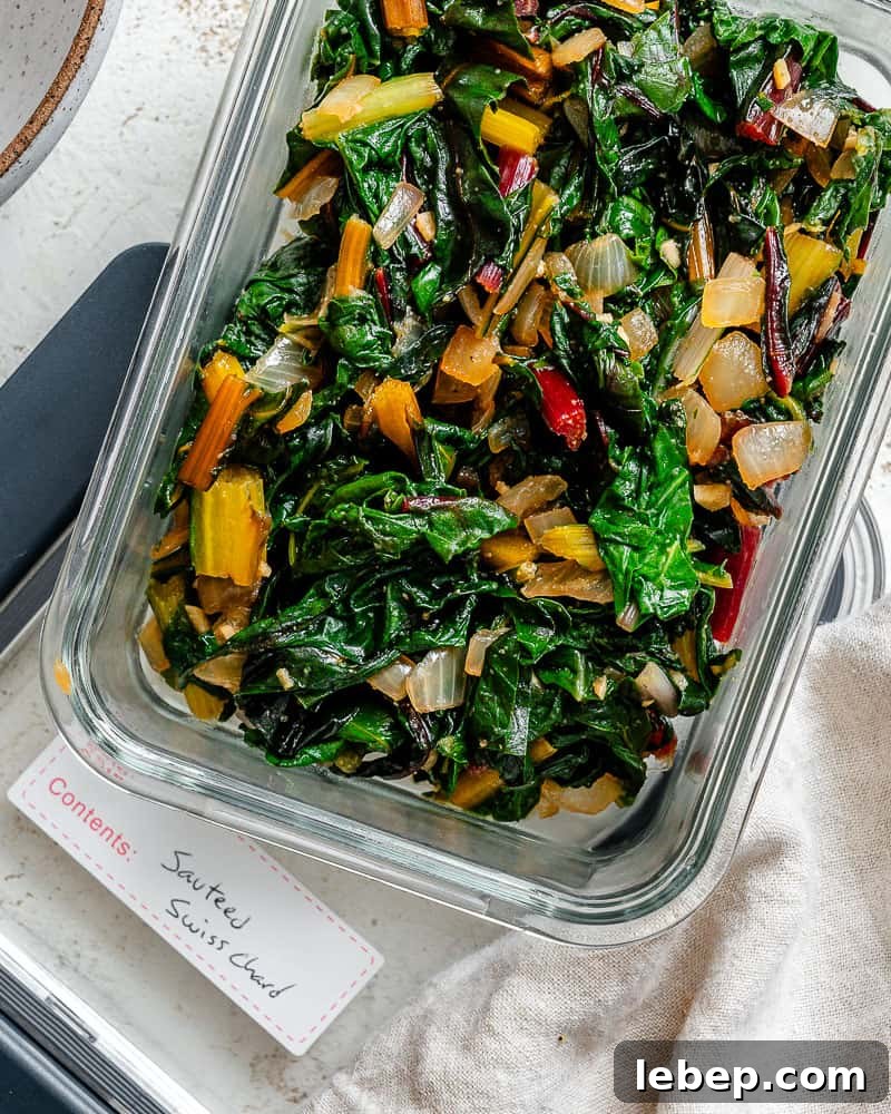 completed Sautéed Swiss Chard [with Garlic] in a storage container