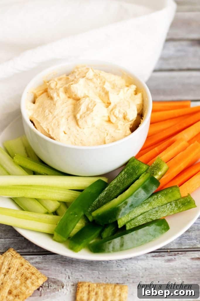 Creamy Buffalo Chicken Dip Recipe for Parties and Game Day 5 A creamy buffalo cheese spread made with cream cheese, hot sauce, and sour cream. It's the perfect spicy spread for crackers and vegetables.