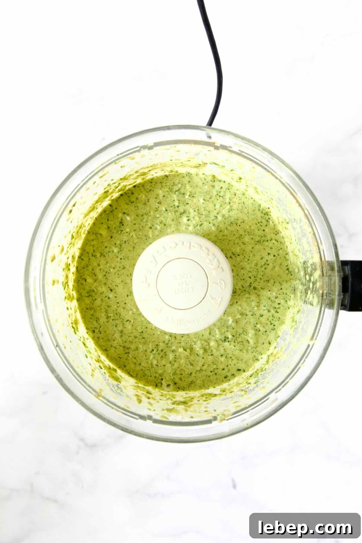 Yogurt marinade in food processor after being pureed.