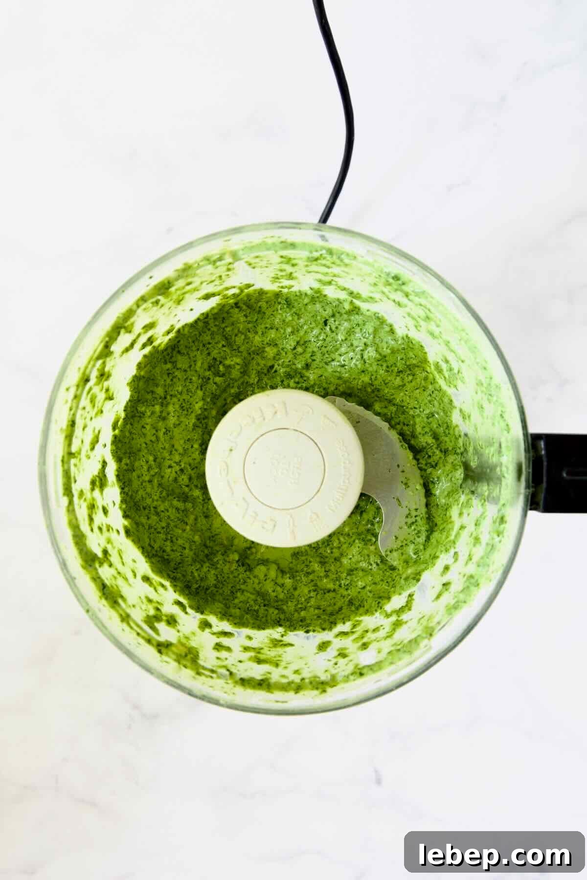 Cilantro Mint Chutney in food processor after being pureed.