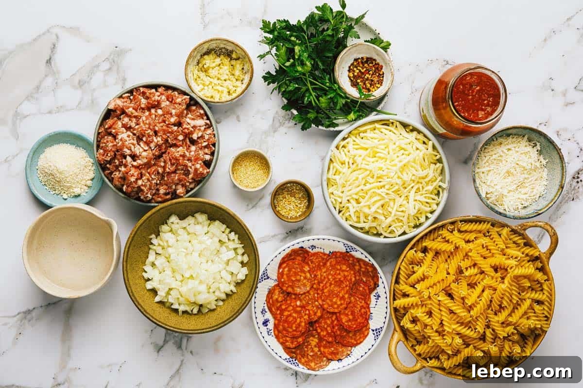 Pepperoni & Sausage Pizza Pasta Bake Recipe 3 Bowls of ingredients to make pepperoni sausage pizza pasta.