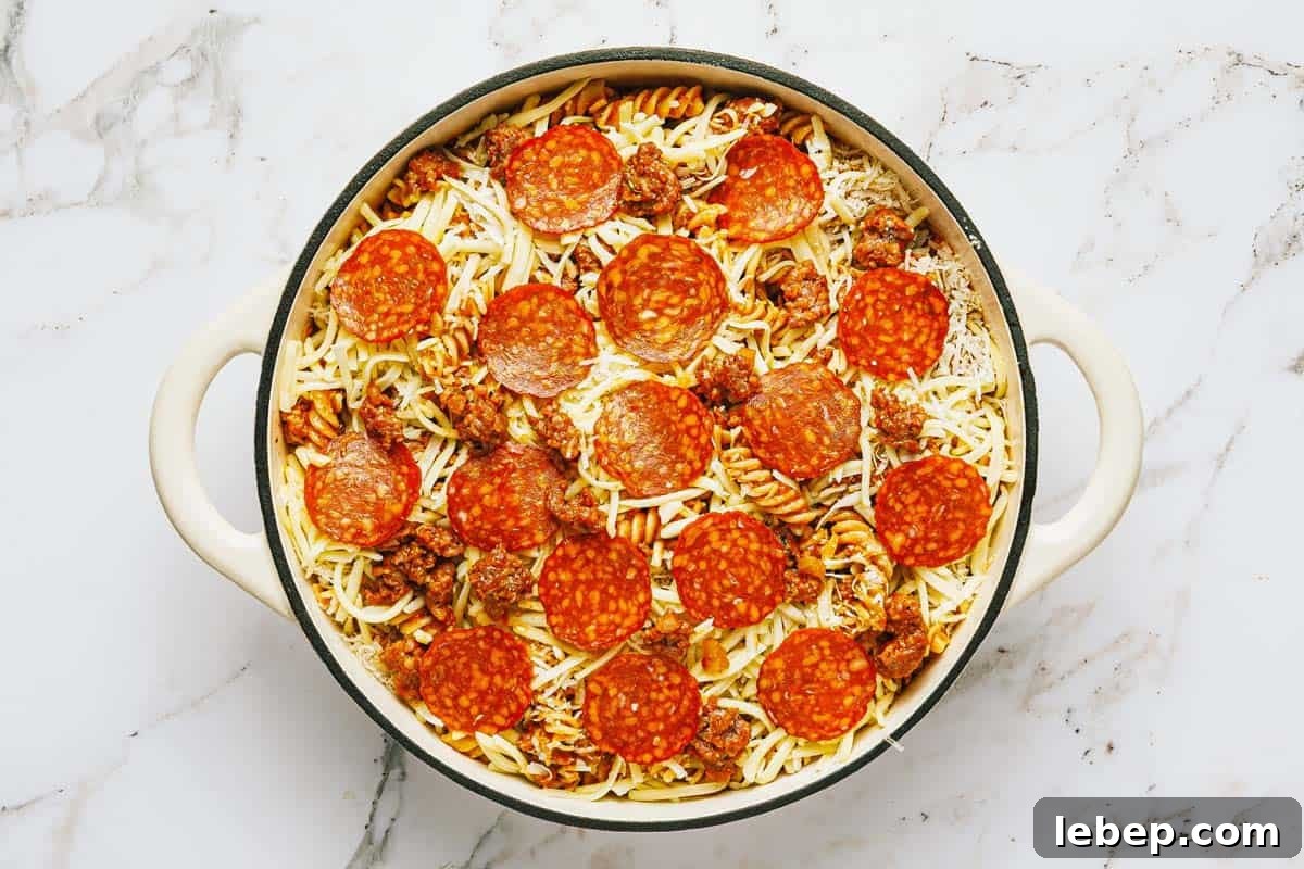 Pepperoni & Sausage Pizza Pasta Bake Recipe 7 Mozzarella and pepperoni on top of an easy sausage pasta.