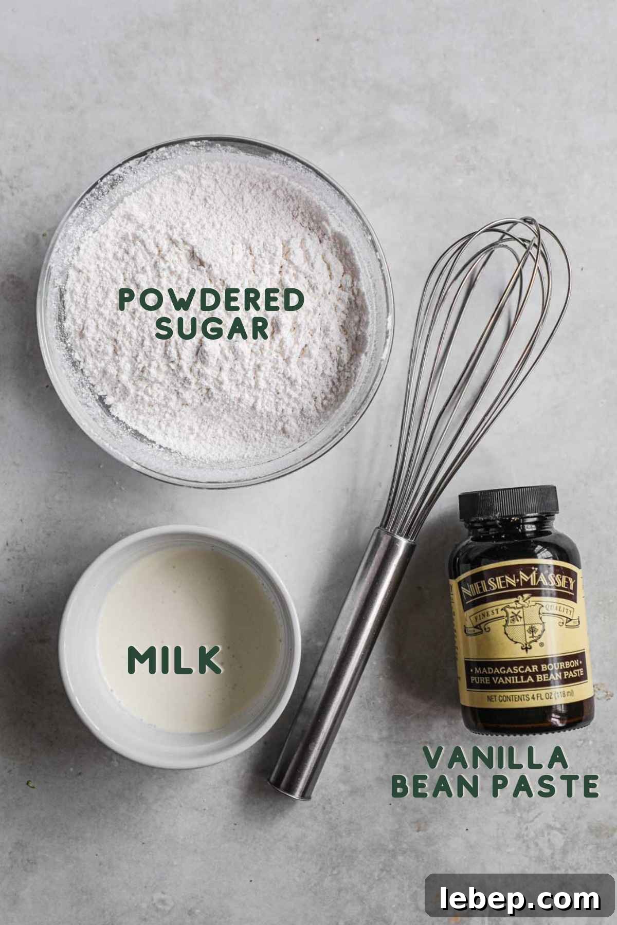 Ingredients to make easy vanilla icing, powdered sugar, vanilla bean paste, milk, salt.