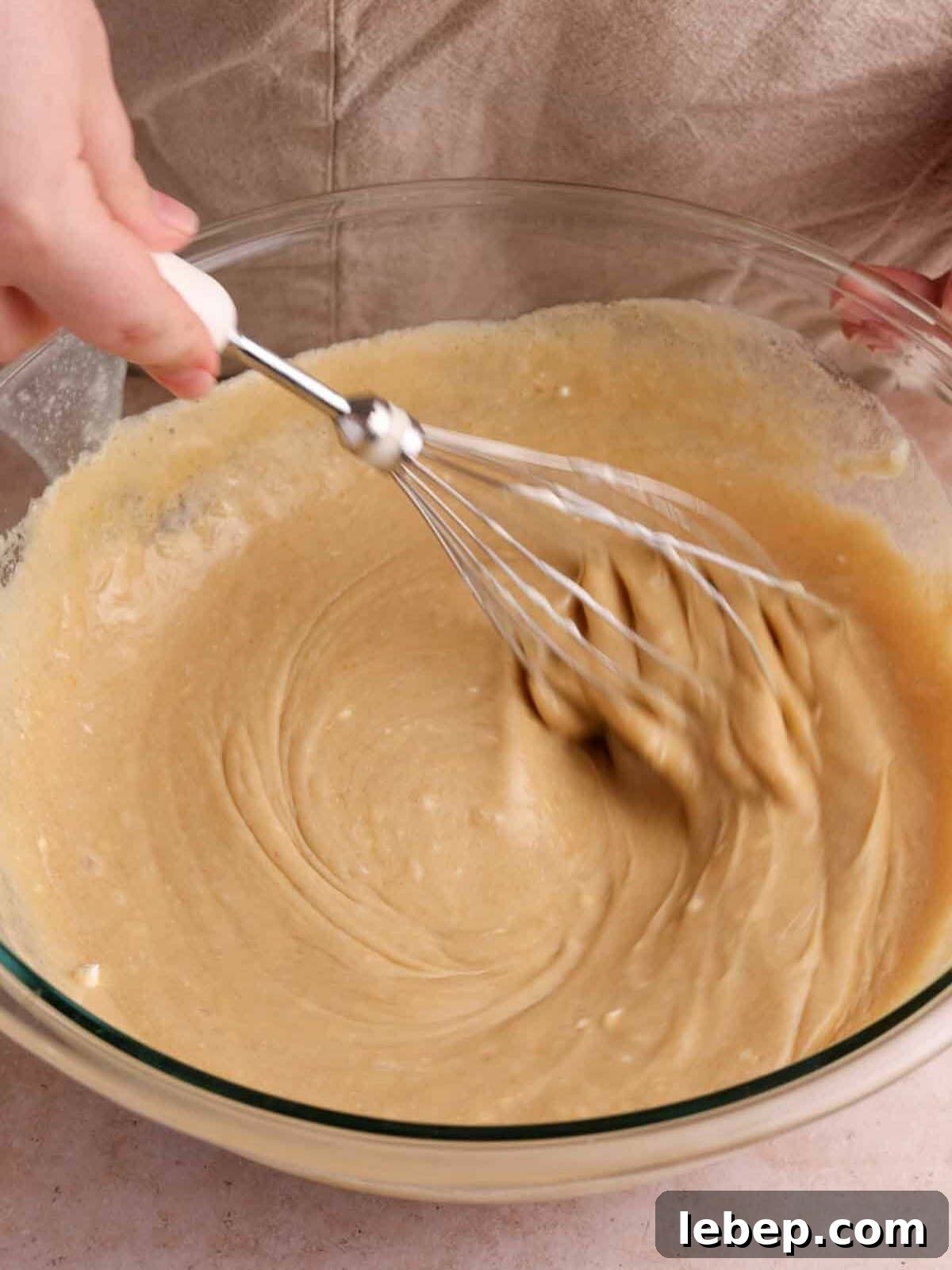 Decadent Banoffee Cake Recipe with Caramelized Bananas 7 add rest of wet ingredients and whisk