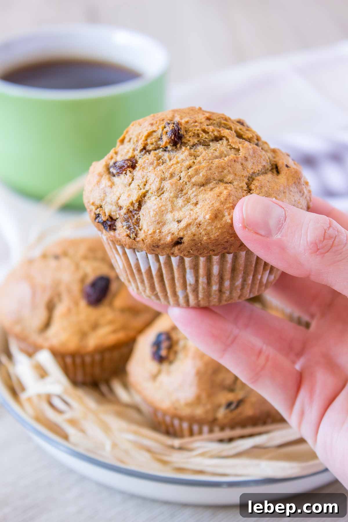 Irish Soda Bread Muffins: Classic St. Patrick’s Day Recipe 7 Hand holding Soda Bread Muffin