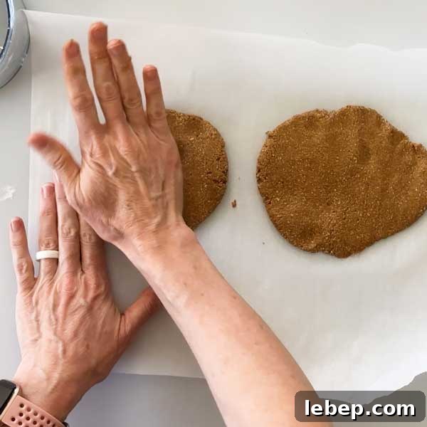 Mixing cranberries into muffin batter.