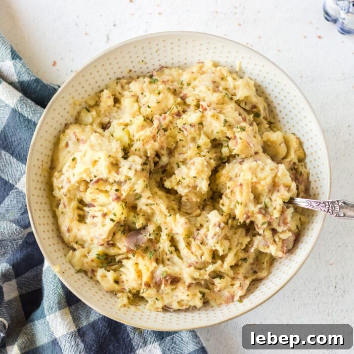 Overhead view of a bowl of garlic mashed potatoes for feature image.