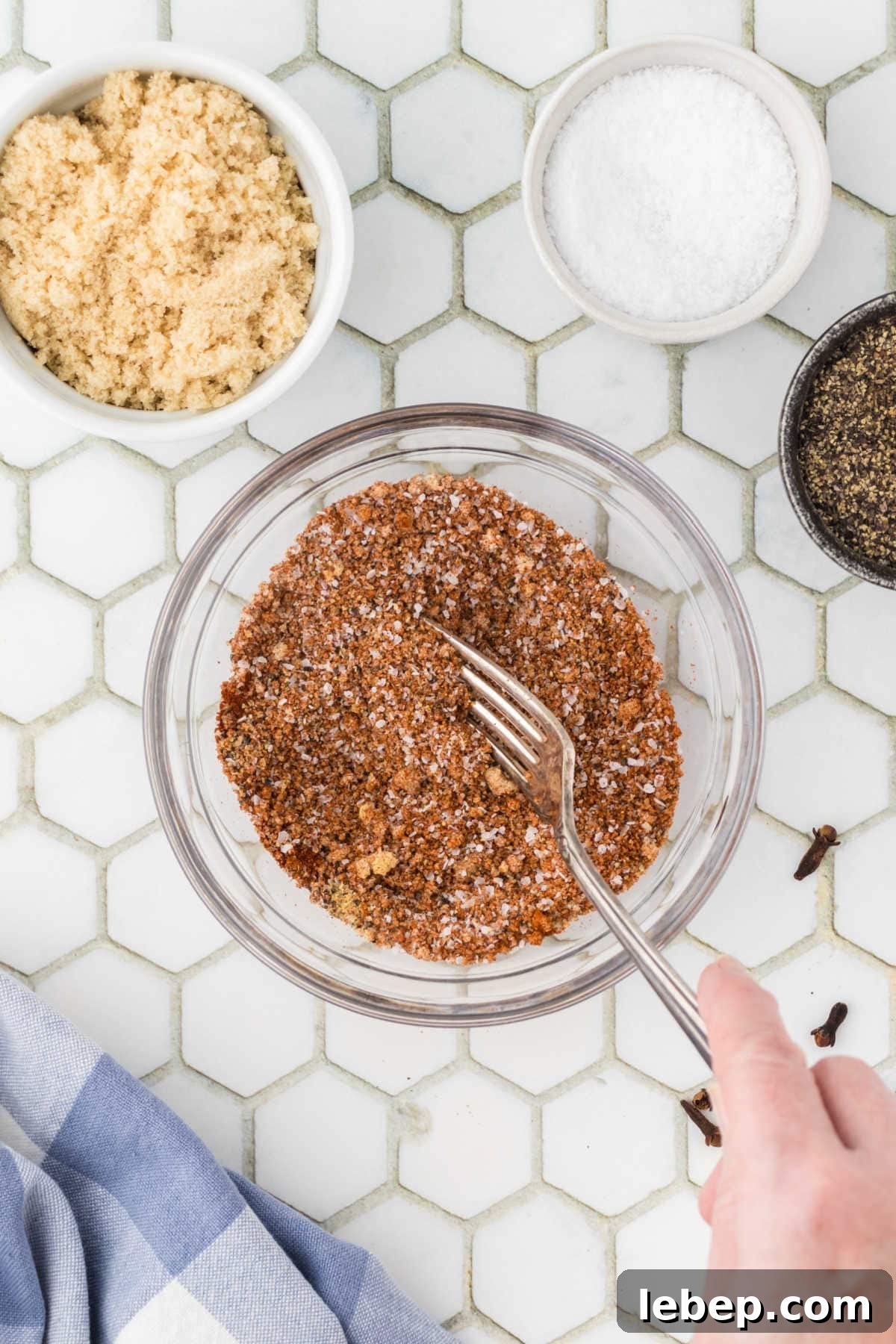 Dry rub ingredients being mixed together.