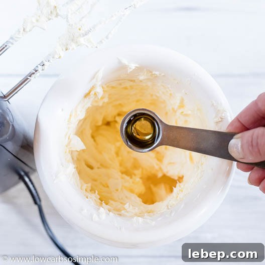 Sugar-Free Vanilla Frosting Recipe That Actually Tastes Amazing 11 Adding Vanilla Extract | Low-Carb, So Simple
