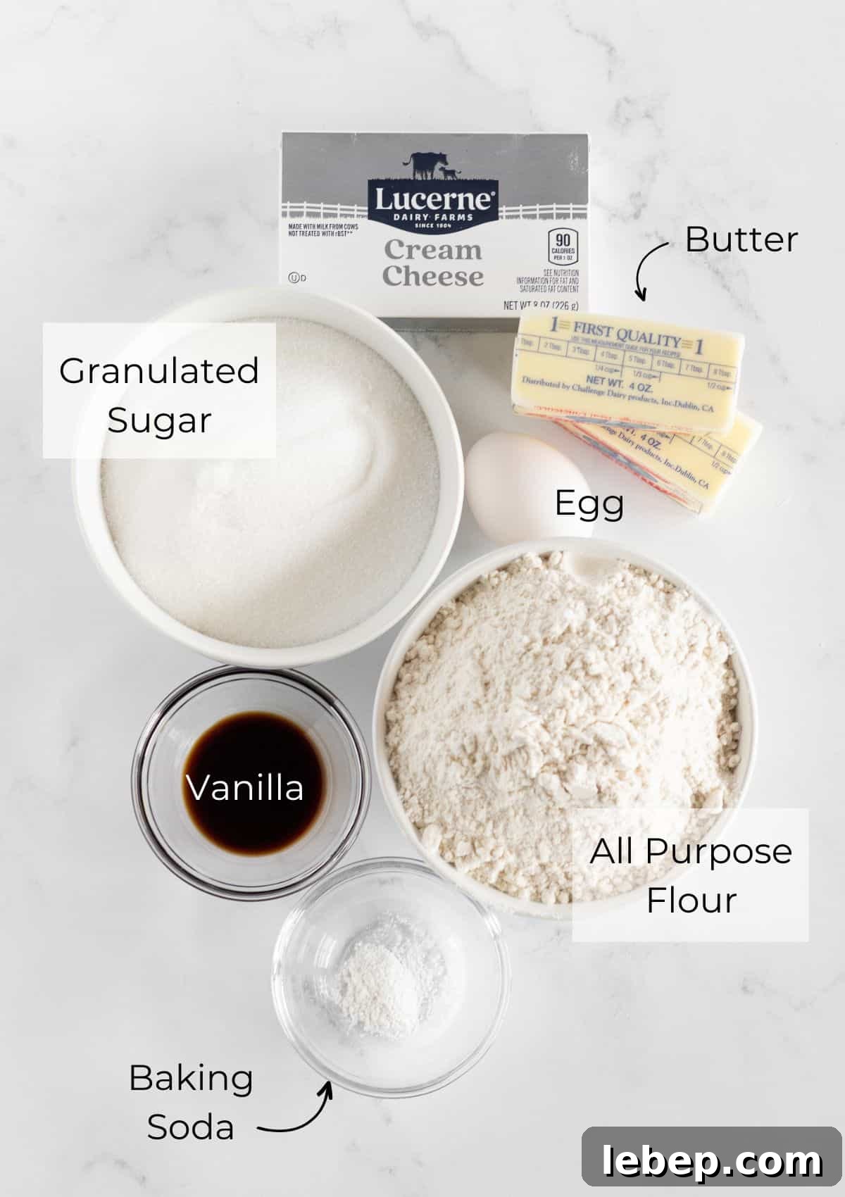 All of the ingredients needed to make cream cheese sugar cookies.