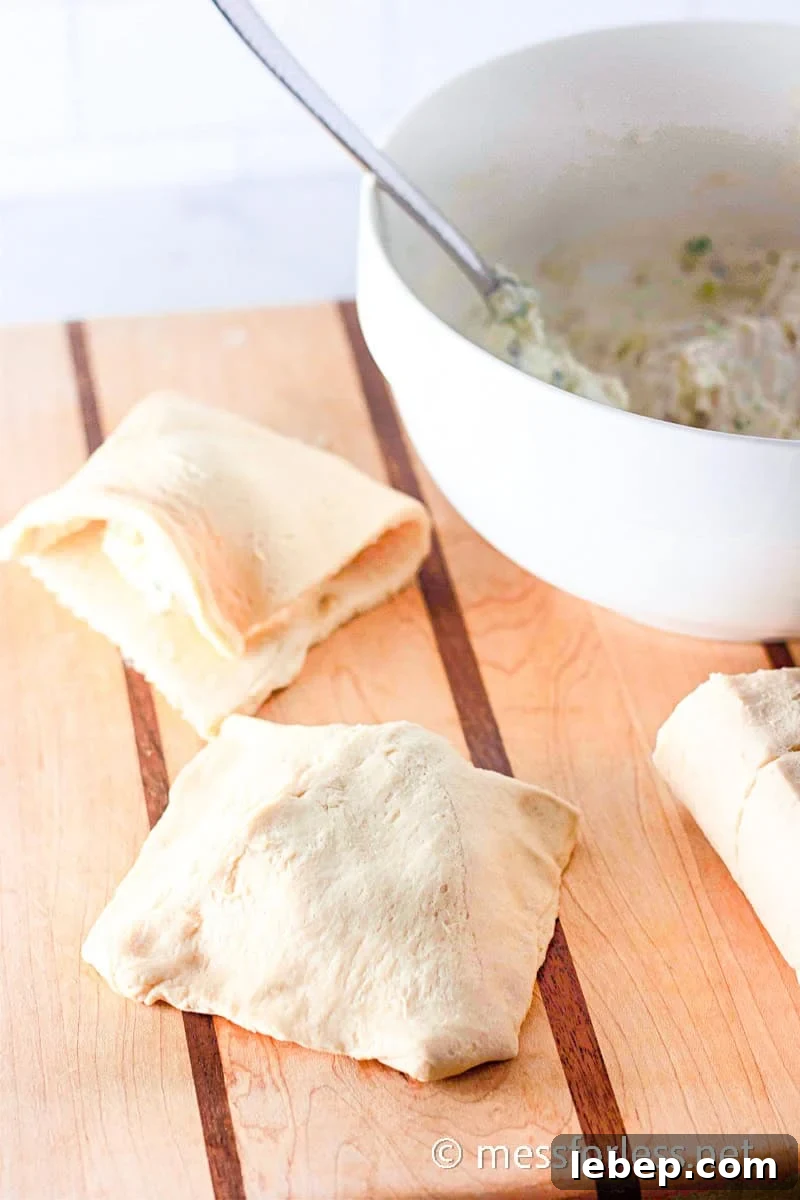 Cheesy Chicken Crescent Bake with Puff Pastry Squares 9 crescent dough foled over a chicken mixture to form a square