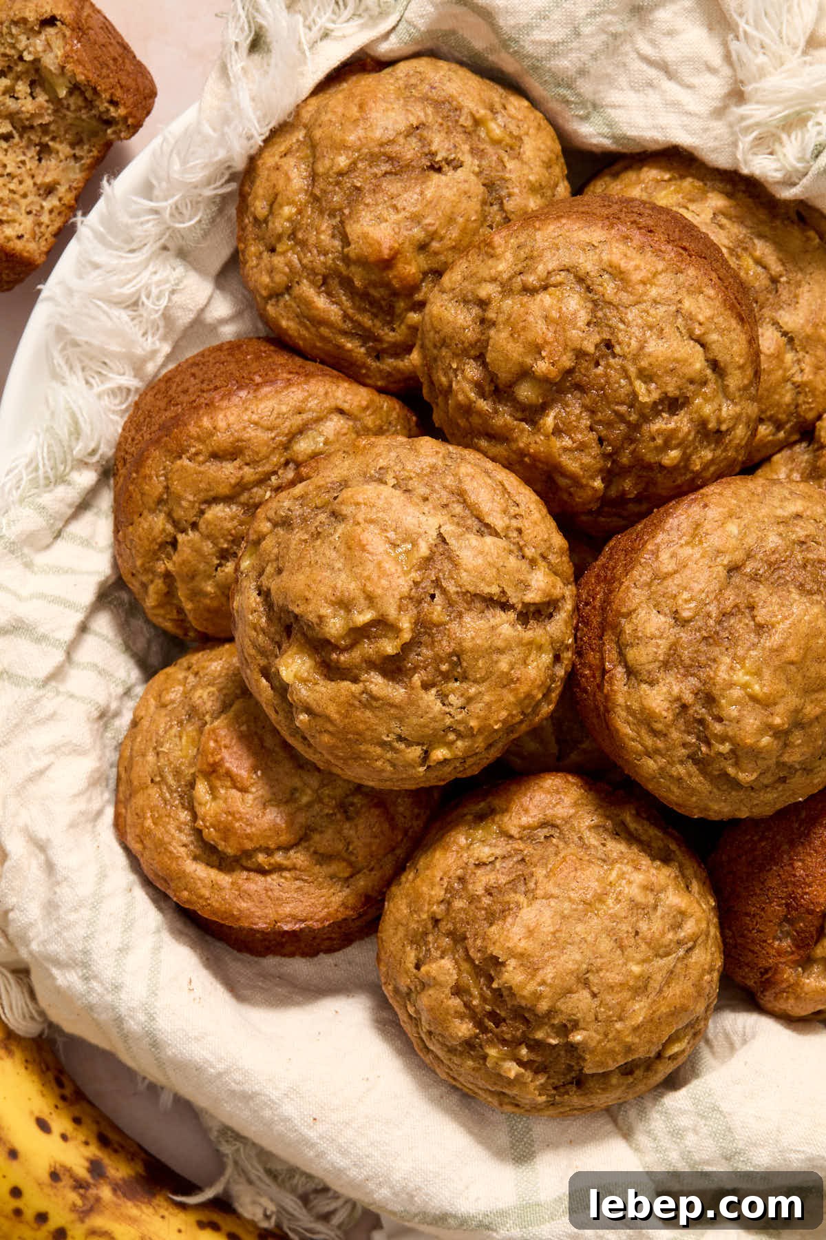 Spelt Flour Peanut Butter Banana Muffins — Naturally Sweetened 2 Overhead of muffins in a napkin lined basket.